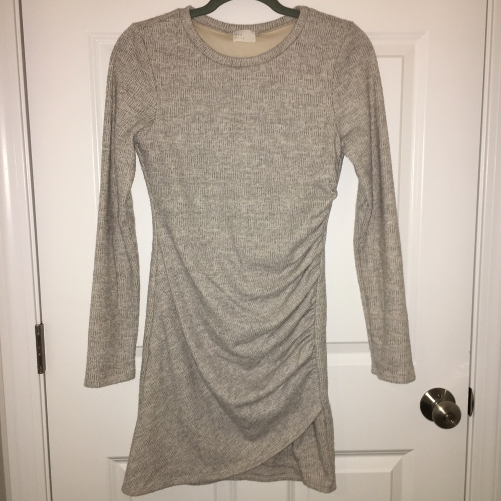 New without tags. Ruched long sleeve sweater mini dress